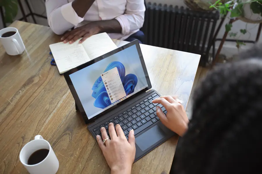 Close up shot of a woman on a laptop using Microsoft 365